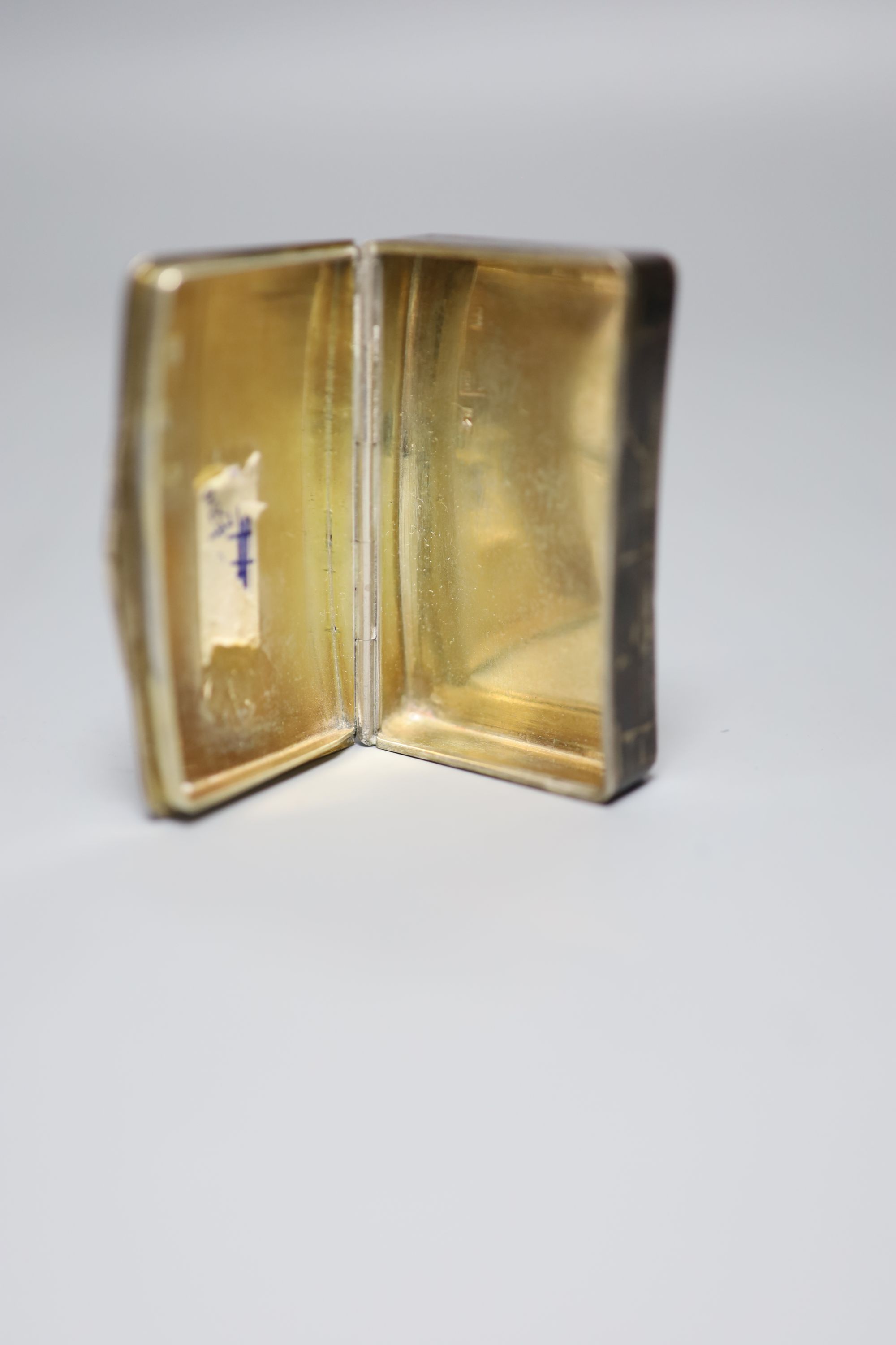 A 19th century Russian 84 zolotnik and niello concave snuff box, dated 1836, 64mm, gross 59 grams,